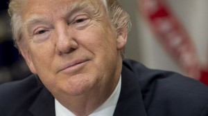 (FILES) This file photo taken on February 14, 2017 shows  US President Donald Trump speaking during a meeting at the White House in Washington, DC. Trump said on February 25, 2017, he will not attend the White House Correspondents' Dinner, breaking with an annual tradition in which the US president attends a light-hearted roast held by journalists and attended by celebrities. / AFP / SAUL LOEB